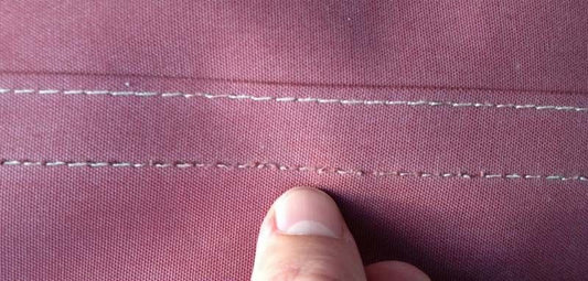 Storm, regen, wind…hoe staat het eigenlijk met de stiksels van uw bootkap?